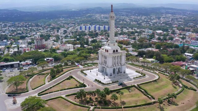Monument to heroes of restoration on hill of Santiago and city view. Aerial orbit 