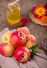 Apple and honey, traditional food of jewish New Year celebration, Rosh Hashana. Selective focus. Copyspace background