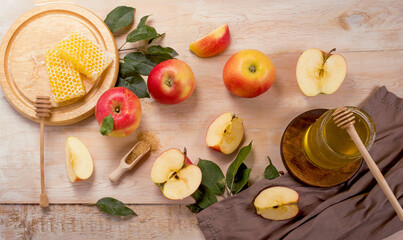 Jewish holiday Rosh Hashana background with apples and honey on blackboard. View from above. Flat lay
