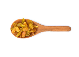 raisins in wood spoon isolated on white background