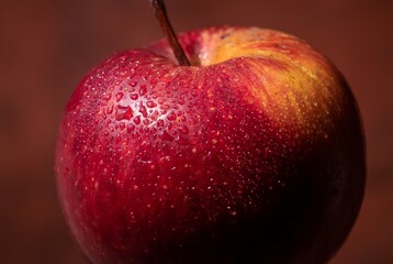 Macro of Water Drops on a Ripe Apple in Horizontal Orientation, Perfect for Background and Wallpaper