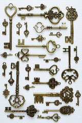 Fototapeta na wymiar Bronze keys ornamental keys for clocks and treasure boxes
