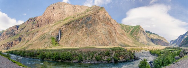 Chulyshman river valley with waterfall in Altai mountains 