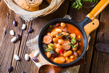 Delicious bean stew with sausage and potato