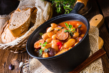 Delicious bean stew with sausage and potato