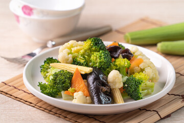 Homemade fresh boiled vegetables with cauliflower, broccoli, black fungus and baby corn.