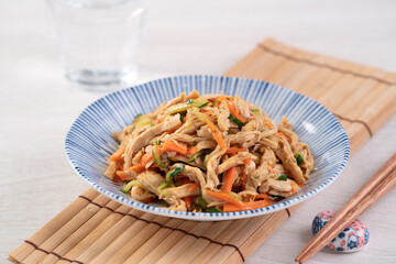 Homemade delicious cold dish of shredded chicken with soy sauce