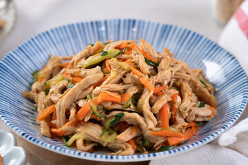 Homemade delicious cold dish of shredded chicken with soy sauce