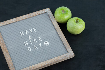 Motivational and inspirational quote written on a grey board