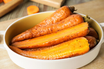 Dish of tasty baked carrot, closeup