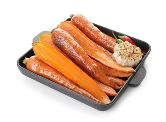Dish of tasty baked carrot on white background