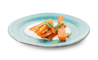 Plate of tasty baked carrot on white background