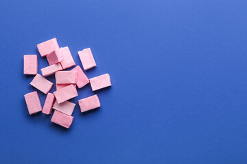 Chewing gums on color background
