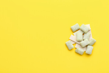 Chewing gums on color background