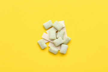 Chewing gums on color background