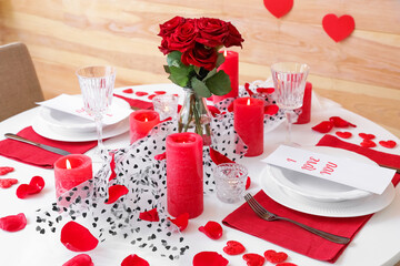 Festive table setting for Valentines Day celebration at home
