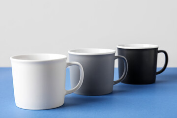 Empty cups on color table