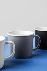 Empty cups on color table