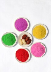 Top View of Holi Festival Colors or Gulal Isolated on White Background, Perfect for Wallpaper
