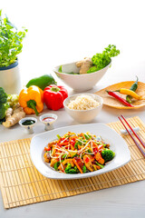 sweet and sour chicken with rice and vegetables