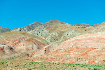 Cross-bedding in Candy Cane Mountains in Azerbaijan. Colorful stripes of the hills. Shale striped mountains.