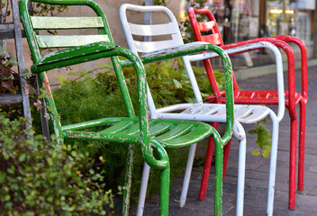 Three colorful chairs in Italian colors