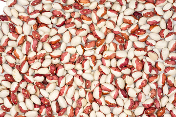 Beans as a background isolated on white, top view