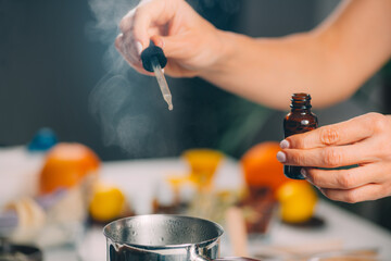 Woman Preparing Homemade Soap with Essential Oil Extracts