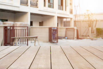 Empty old wooden front of outdoor building a village, townhome and real estate  background with sunlight and bokeh with empty copy space. Ready for product display montage concept.