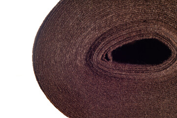 roll of brown dense fabric on a white background, side view, close-up, background, texture