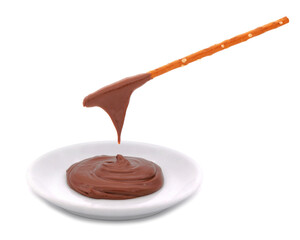 Pretzel sticks dipped in chocolate cream isolated on white
