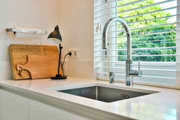 Close up of elegant sink in luxury kitchen
