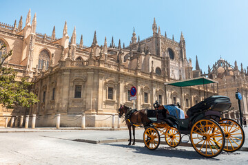 Naklejka na ściany i meble Seville Cathedral and carriage