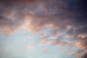 Rain clouds in the sky at sunset