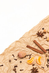 Peeled tangerines and spices. Cinnamon sticks and  star anise