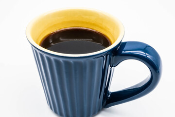 マグカップに入ったブラックコーヒー