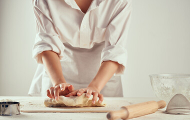 Woman chef preparing dough household healthy food