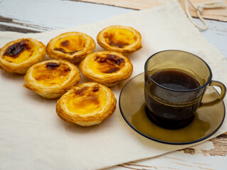 portughese dessert pasteis de nata with coffee