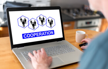 Cooperation concept on a laptop