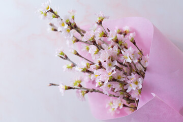 Cherry blossom bouquet in pink wrapping