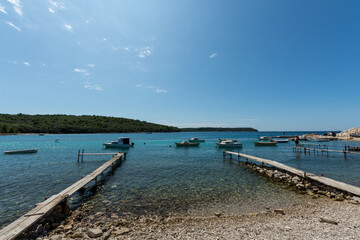 Fototapeta na wymiar Boats in a bay, in Banjole, Croatia