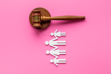 Family figure with judge gavel. Family law concept
