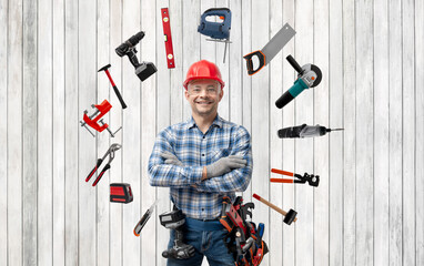 worker handyman ( Jack of all trades ) or builder with construction tools - 416480927