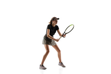 Leader. Young caucasian professional sportswoman playing tennis isolated on white background....