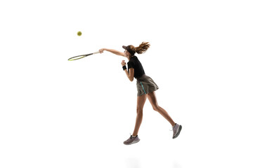 Obraz premium Walk over. Young caucasian professional sportswoman playing tennis isolated on white background. Training, practicing in motion, action. Power and energy. Movement, ad, sport, healthy lifestyle
