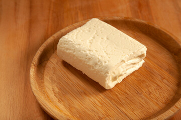  feta cheese in bamboo plate