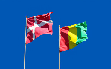 Flags of Guinea and Denmark.