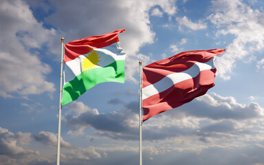 Flags of Kurdistan and Latvia.
