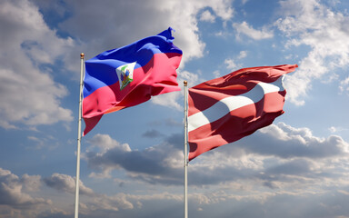Flags of Haiti and Latvia.