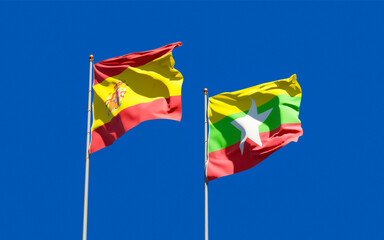 Flags of Myanmar and Spain.